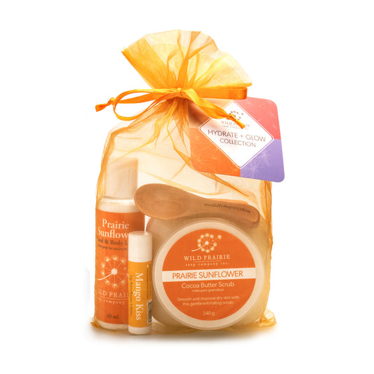 Wild Prairie Soap-Hydrate & Glow Gift Set (contains 1 cocoa butter scrub, 1 x 65 mL lotion, 1 x lip balm, wood scrub spoon in organza bag); Avail in Lavender Bloom, Prairie Sunflower, Rosehip & Grapefruit and Vanilla Bean & Coffee